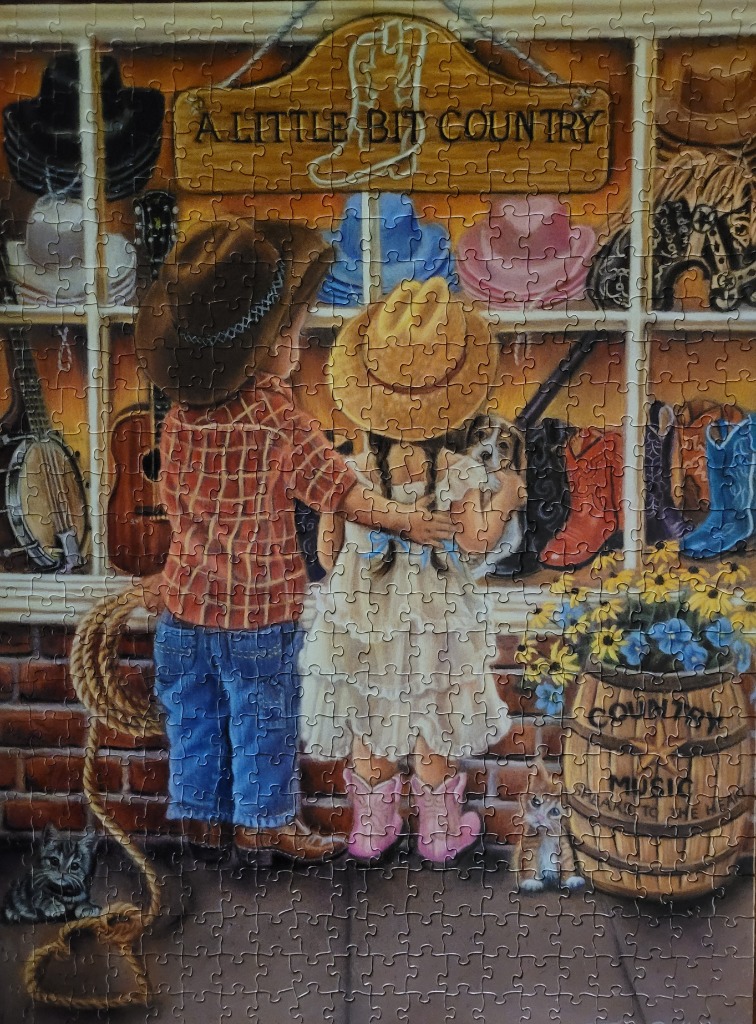 A boy and girl looking into a country-themed shop window.
