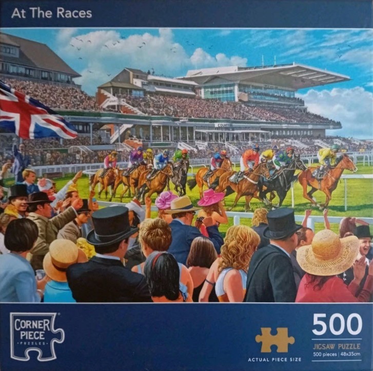 A lively scene at a horse race track with jockeys on horseback galloping past a crowd of spectators in formal attire.