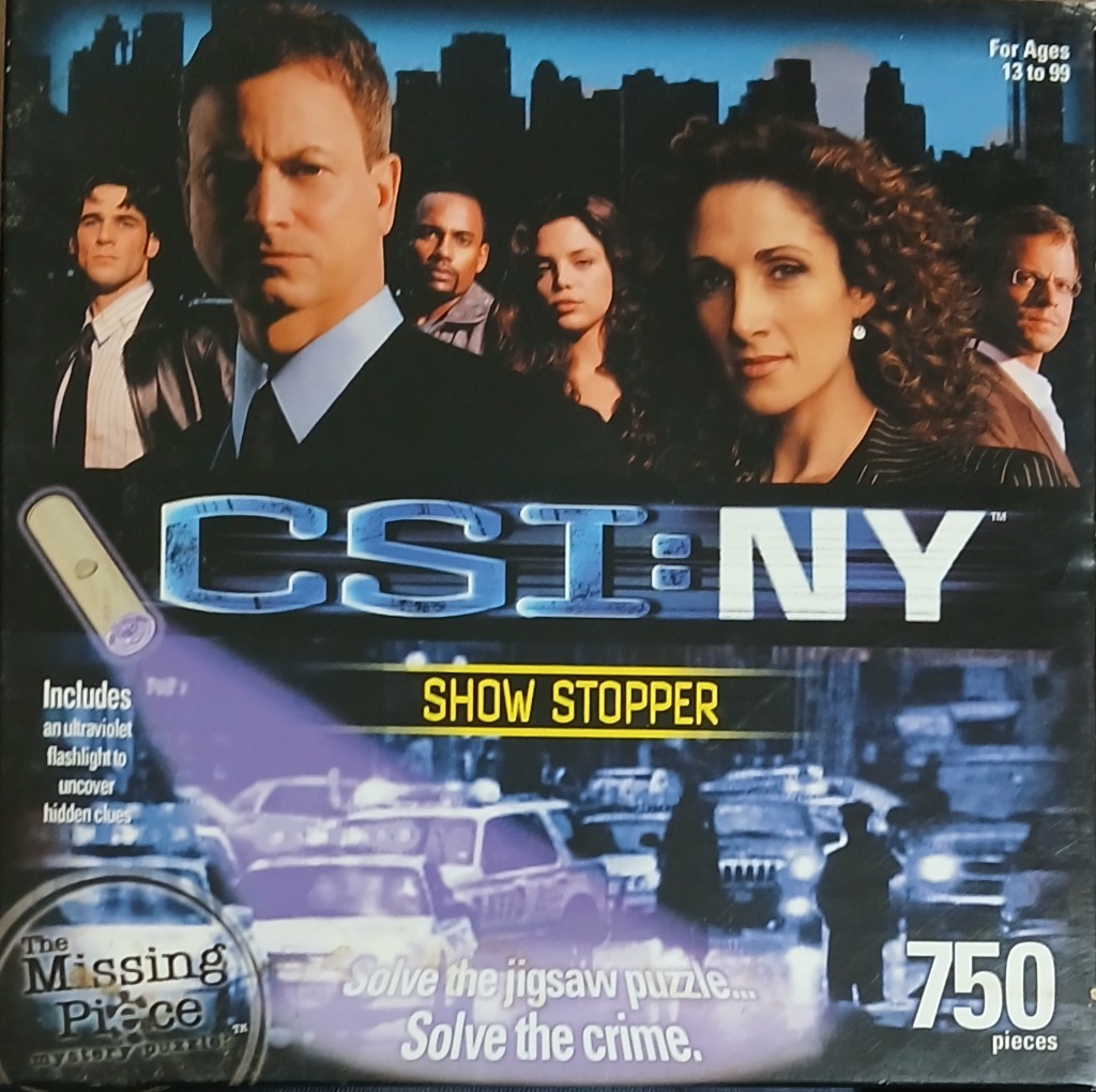 Group portrait of a detective team against a New York City skyline silhouette at night.