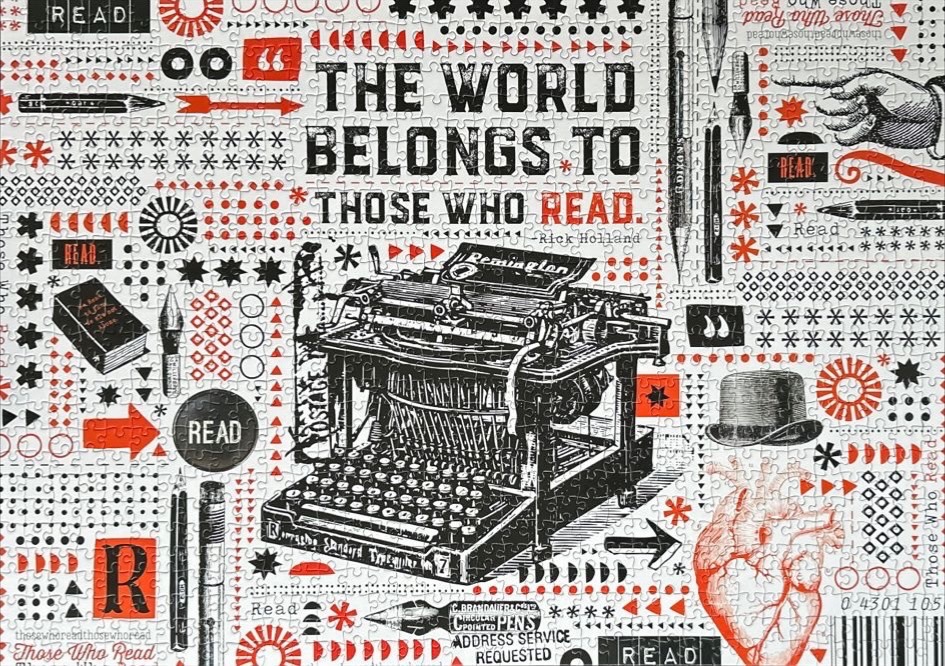Graphic typography illustration featuring a vintage typewriter with the quote 'The world belongs to those who read.'
