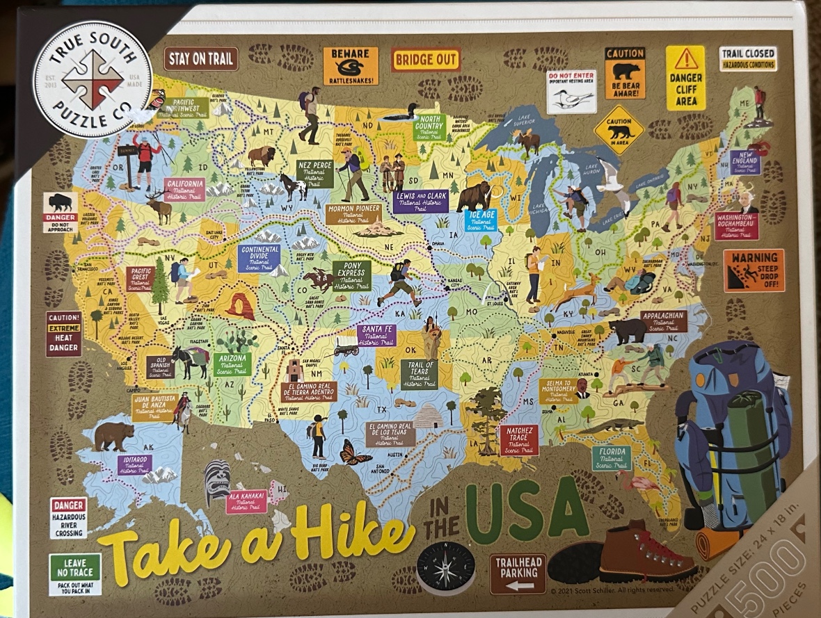 Illustrated map of the United States featuring various hiking trails and outdoor warning signs.