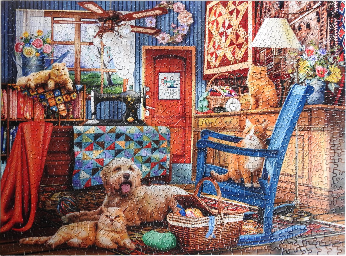 A cozy craft room scene featuring several cats, a dog, and quilting supplies.