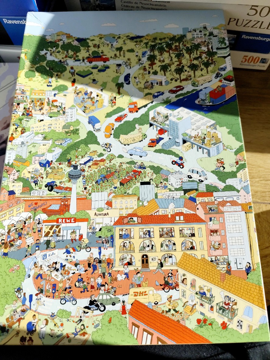 A busy, hand-drawn cartoon map of a modern German city featuring people, vehicles, and the Berlin TV tower.