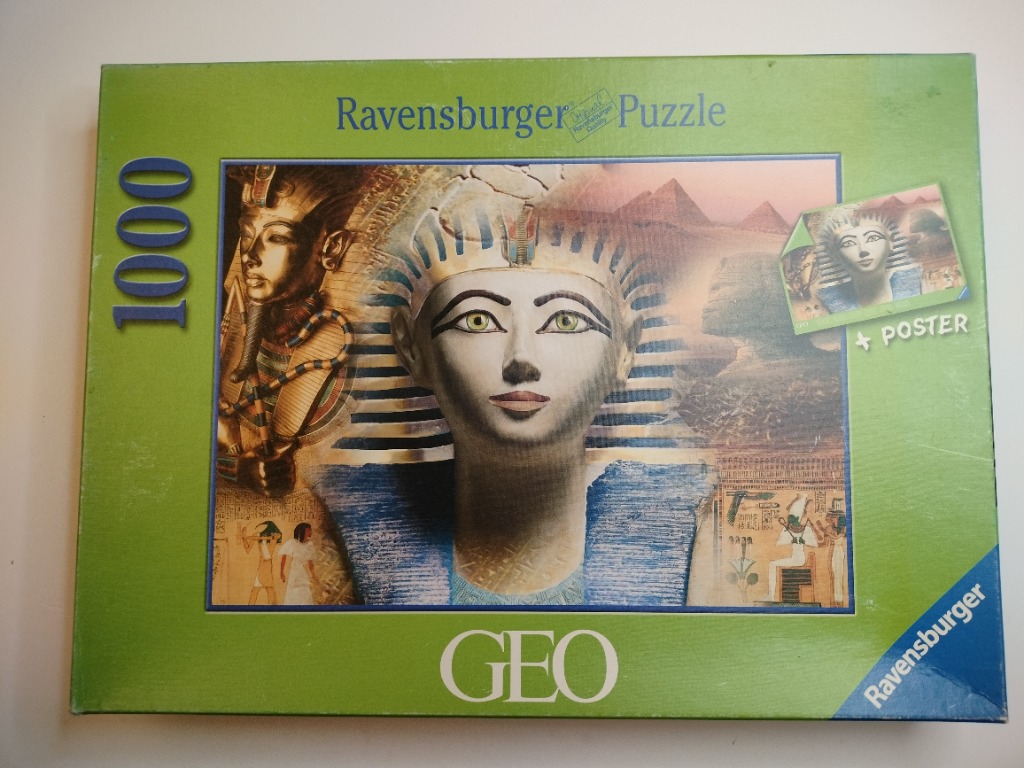 Artwork featuring an Egyptian pharaoh head, pyramids, and hieroglyphics in a collage style.