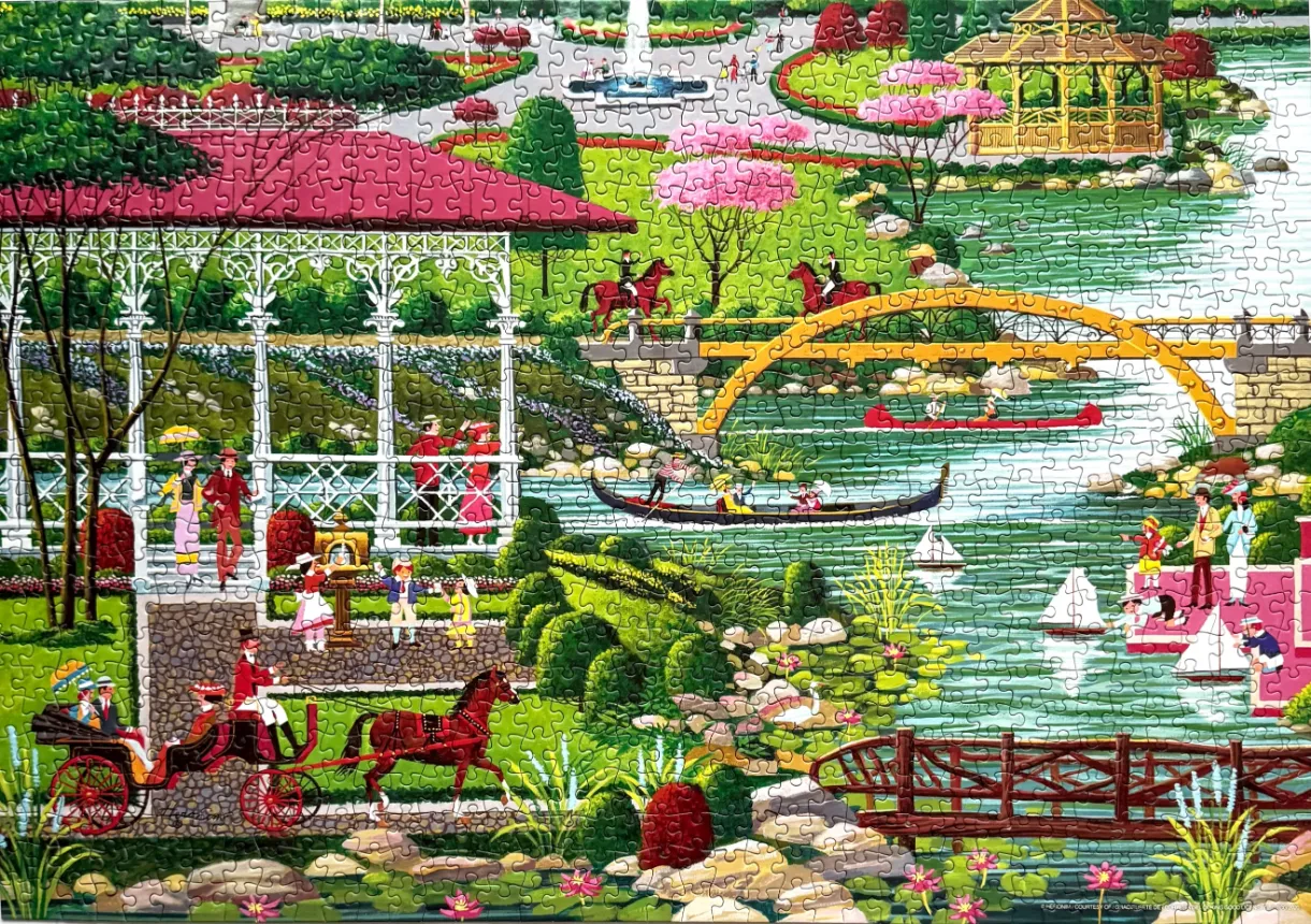 A colourful, busy park scene featuring a gazebo, horse-drawn carriage, gondola, and pond with a yellow bridge.