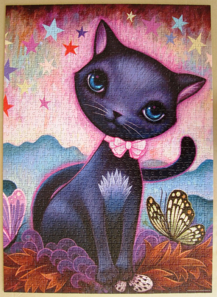 An illustration of a large-eyed, dark purple cat wearing a pink bow, set against a background of stars and clouds.