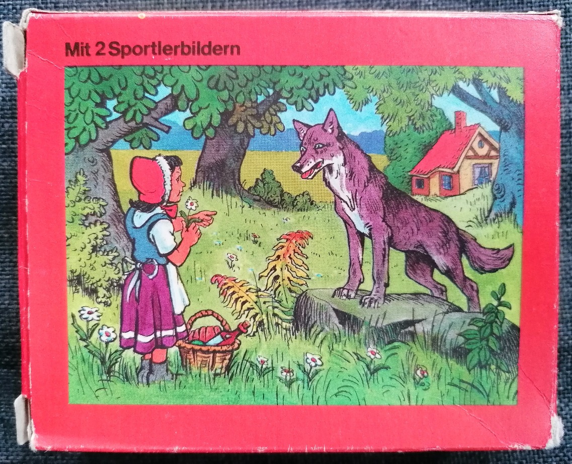 Illustration of Little Red Riding Hood standing in a forest meeting a wolf.