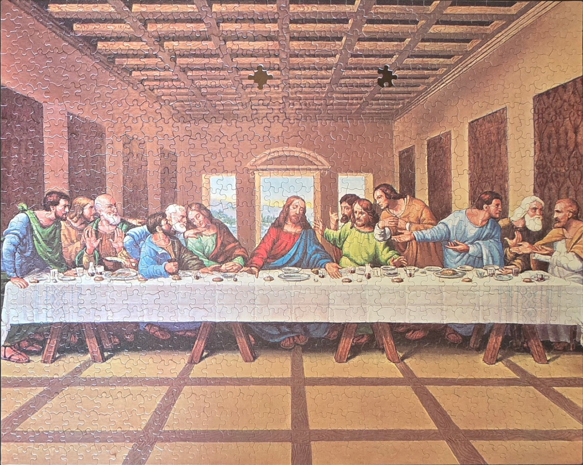 A reproduction of Da Vinci's The Last Supper showing Jesus and his disciples at a long dining table.