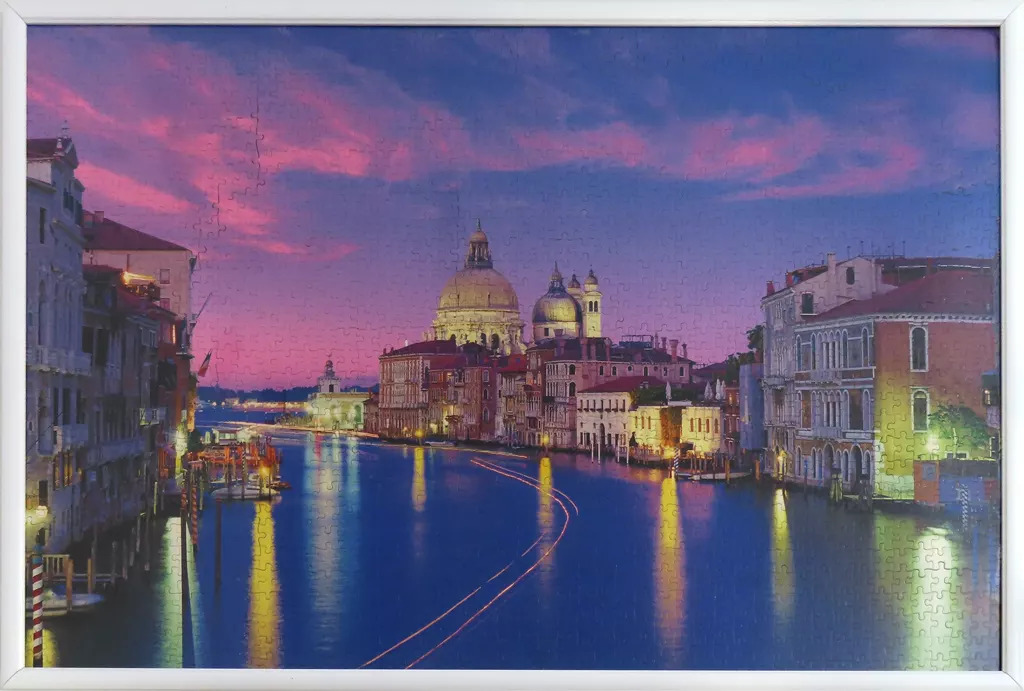 Sunset view of the Basilica di Santa Maria della Salute on the Grand Canal in Venice.