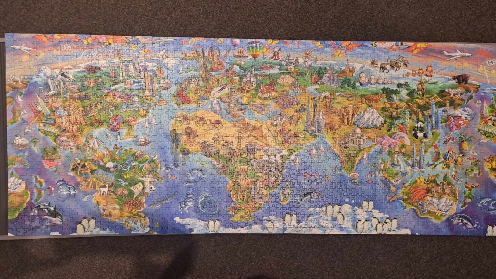Illustrated world map featuring cultural landmarks and wildlife icons across all continents.