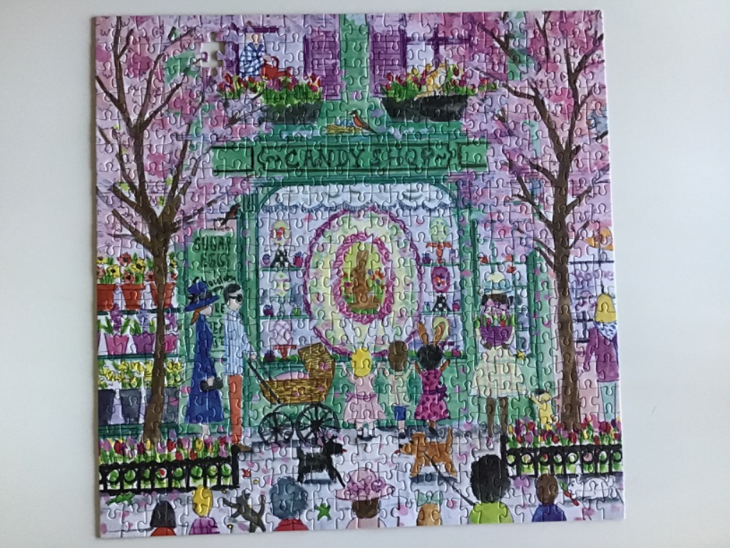 Illustration of a quaint candy shop front with blooming cherry blossom trees and people admiring the window display.