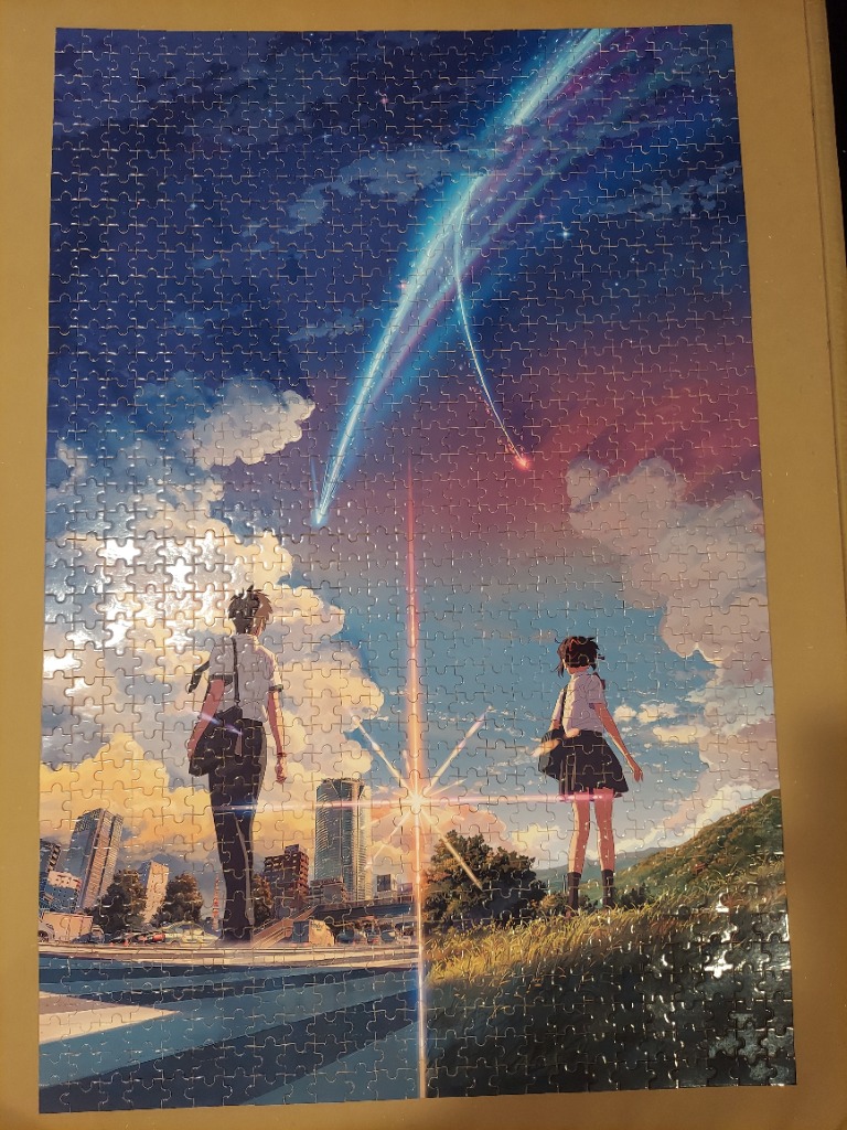 Anime-style illustration of a boy and girl standing in a divided landscape under a split sky with a comet.