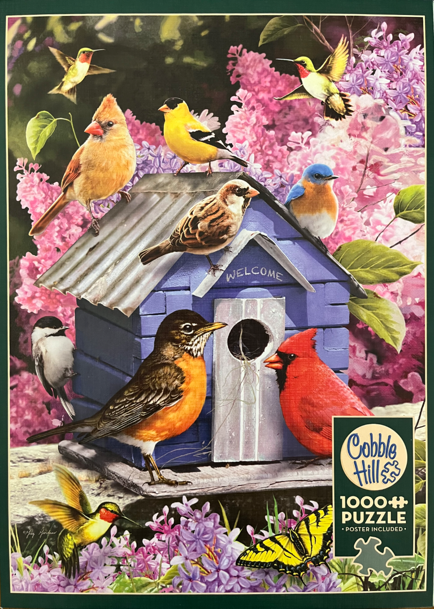 A collection of colorful songbirds gathered around a rustic blue wooden birdhouse surrounded by vibrant purple lilacs.