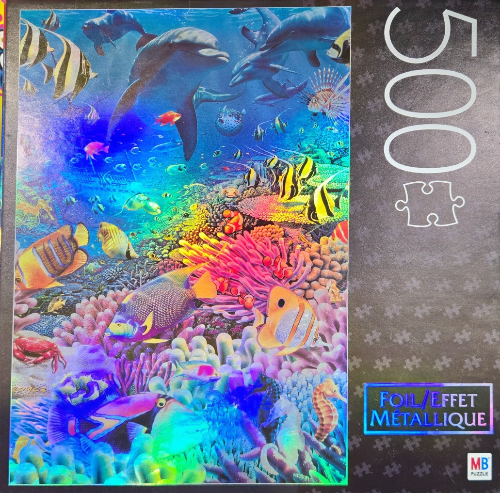 Vibrant coral reef scene with dolphins and diverse tropical fish featuring a shimmering foil effect.
