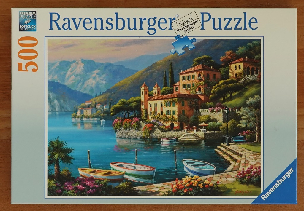 Oil painting of a Mediterranean villa on a lake with wooden boats in the foreground