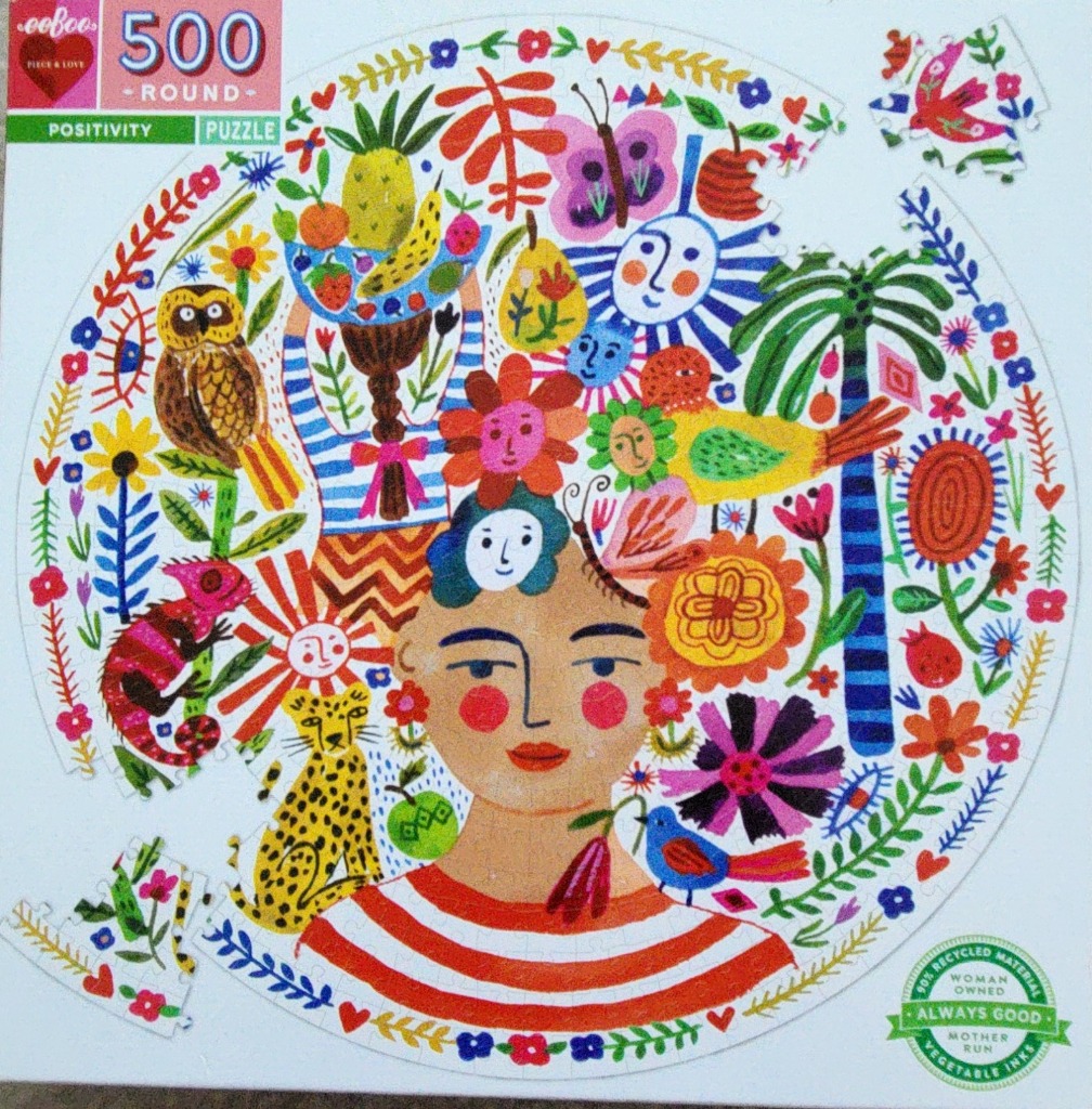 Illustration of a woman's face surrounded by colorful nature, animals, and flowers in a vibrant folk art style.