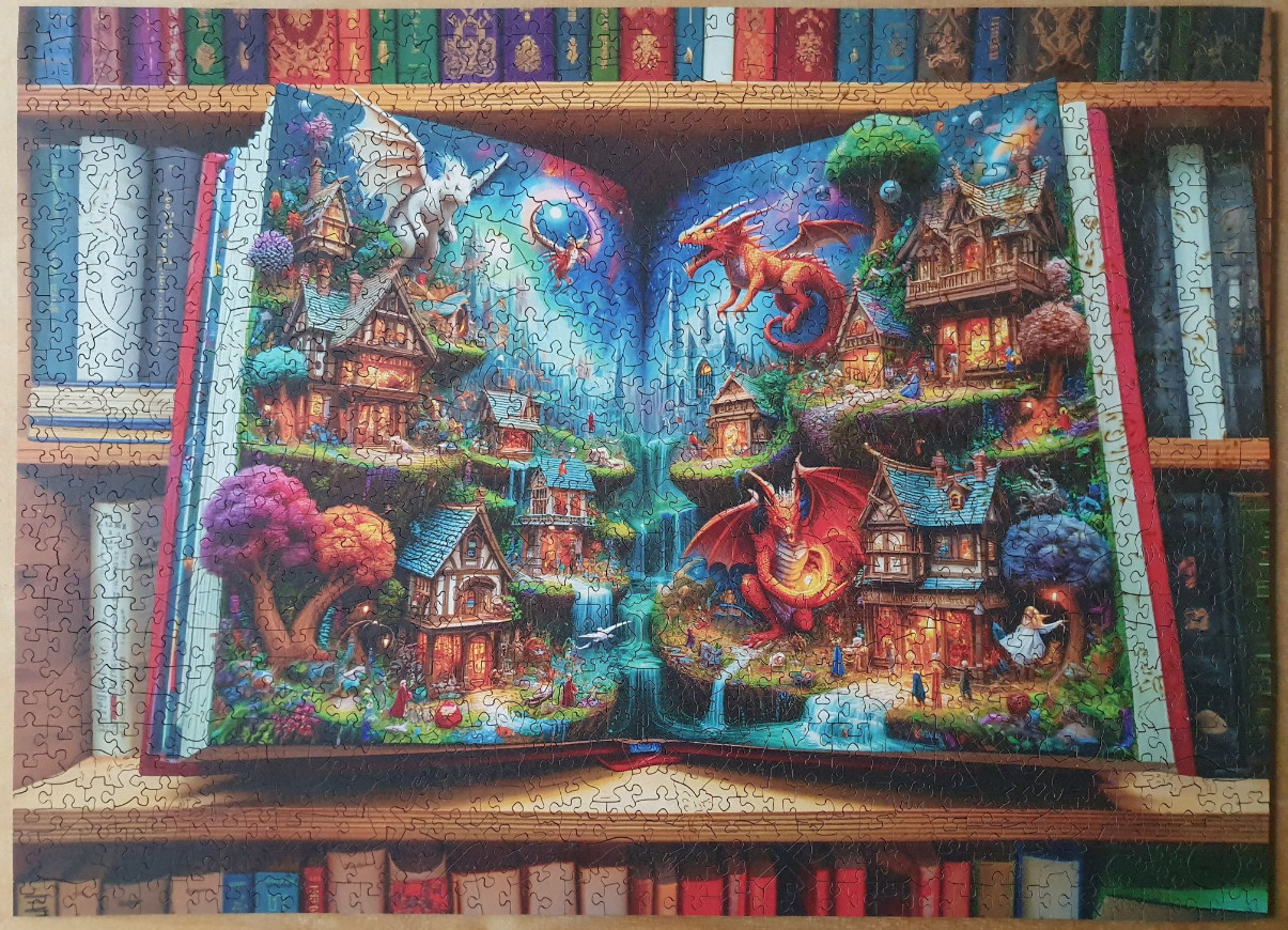 A whimsical open pop-up book revealing a magical fantasy world with dragons, tiny cottages, and glowing landscapes.