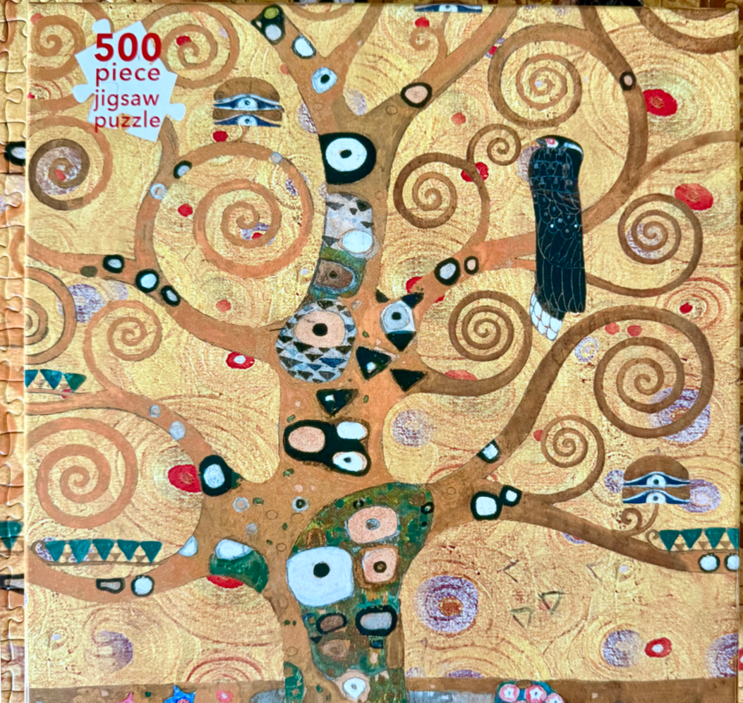 Stylized golden tree with swirling branches and a bird, inspired by Gustav Klimt's art nouveau style.