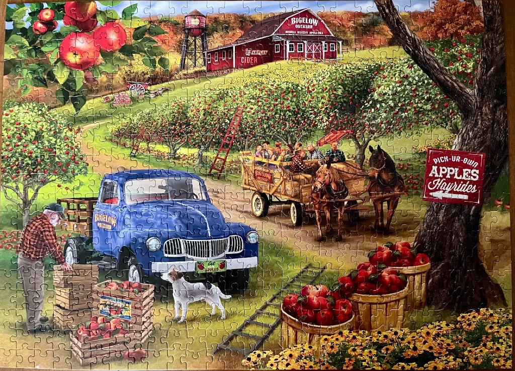 An idyllic autumn orchard scene with a blue vintage truck, horse-drawn hayride, and apple harvesting.