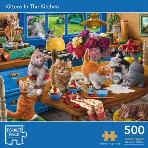 Seven kittens playing in a sunlit kitchen with treats and milk on a wooden table.