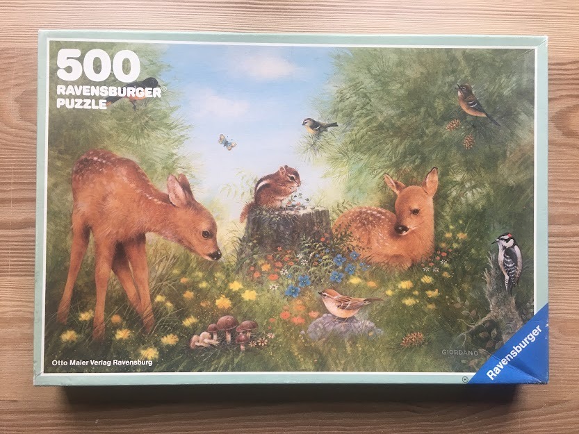 An oil painting of two deer fawns, a chipmunk, and various forest birds in a lush, sunny woodland meadow.