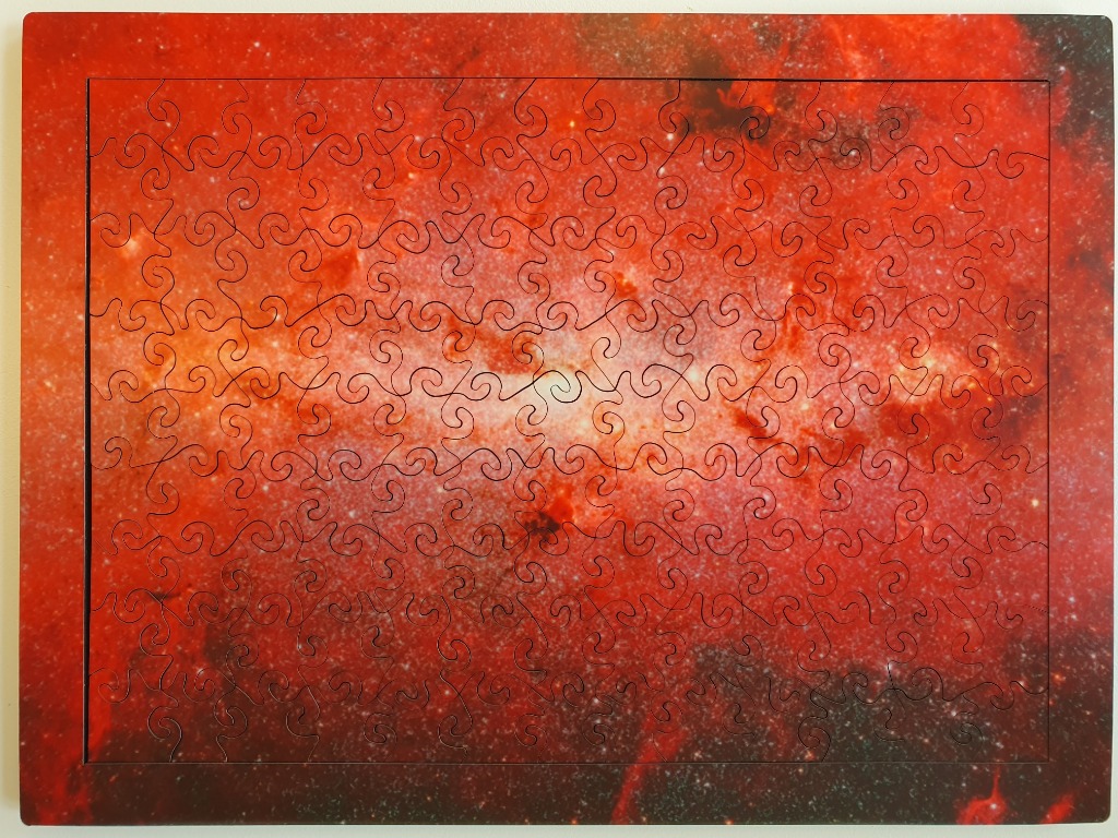 A deep space nebula scene in shades of vibrant red, orange, and white.