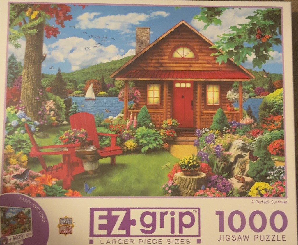 A cozy log cabin beside a blue lake with a lush garden, red chairs, and butterflies in the sunshine.