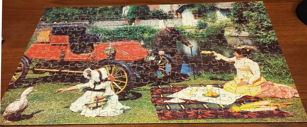 A vintage scene featuring a red antique car, a man, a woman, a child, and a duck picnicking by a pond.