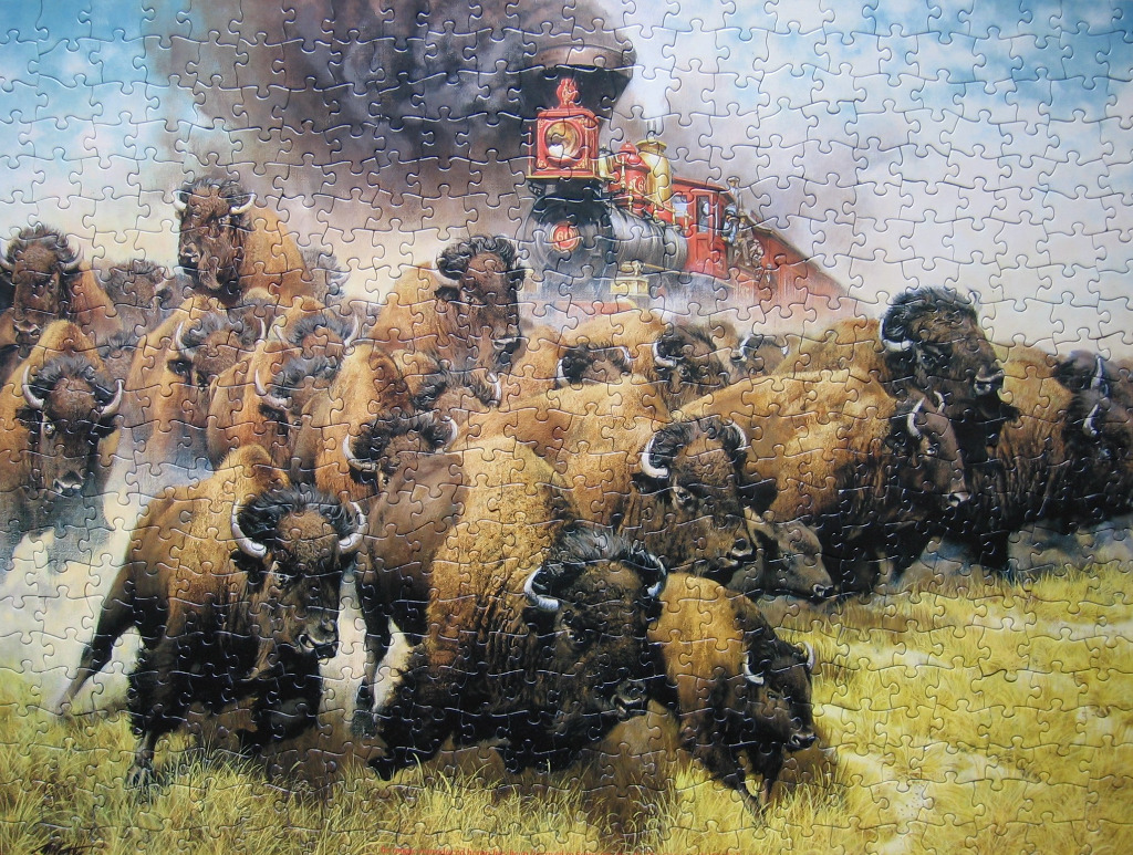 A stampeding herd of bison running from a steam locomotive on a prairie