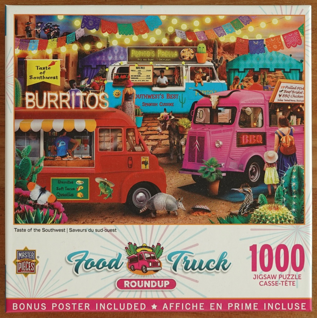 Three colorful food trucks parked in a sunny, decorated Southwest-themed desert scene.