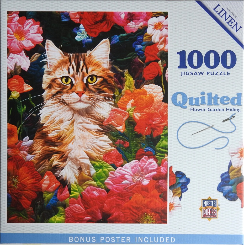 A long-haired tabby cat sitting in a vibrant, quilted garden of colorful flowers.