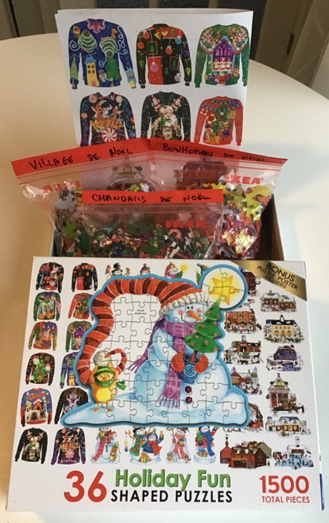 Holiday-themed jigsaw puzzle: snowman, village, and 36 Christmas sweaters.