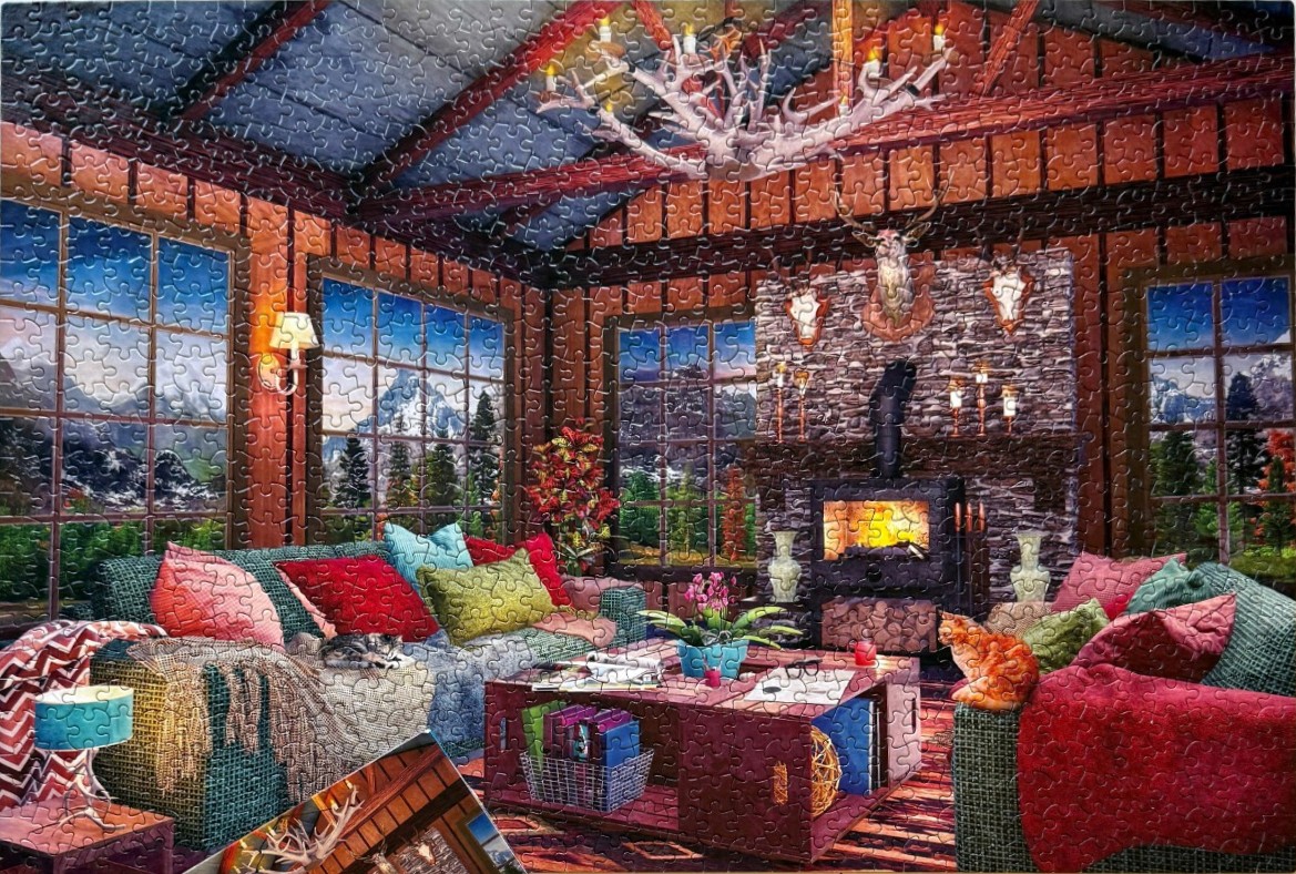 Cozy, rustic cabin interior with a stone fireplace, large windows, and plush furniture.
