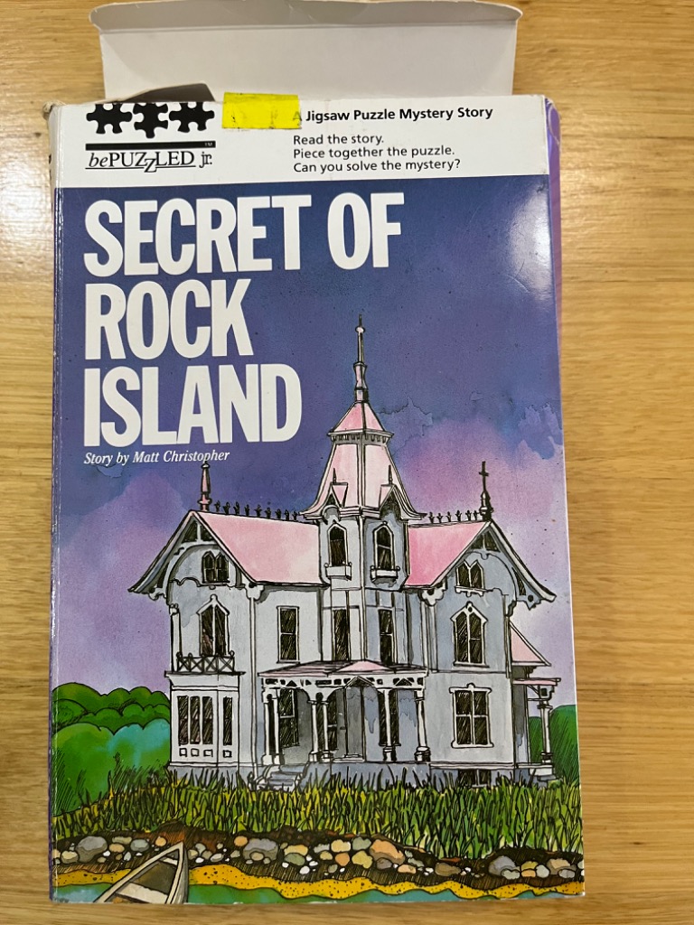 An illustration of a spooky Victorian-style house on an island with a purple sky and green grass.