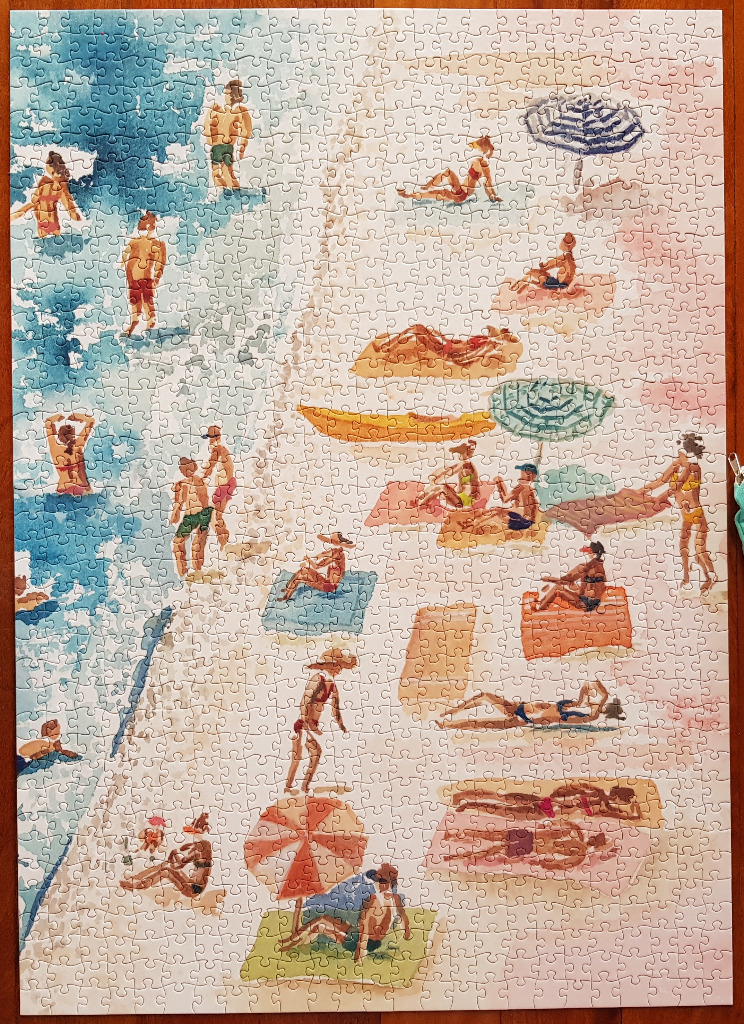 A watercolor painting of a bustling beach scene with swimmers in the water and sunbathers on the sand.