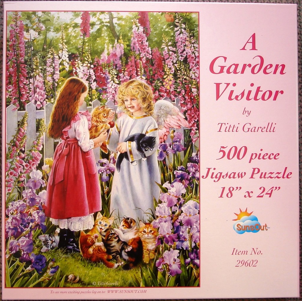 A girl and a blonde angel holding kittens in a lush garden filled with tall foxgloves and purple irises.