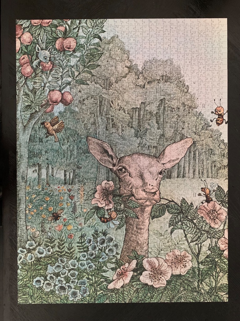 An illustration of a deer head peering through flowers with an apple tree, insects, and a forest background.