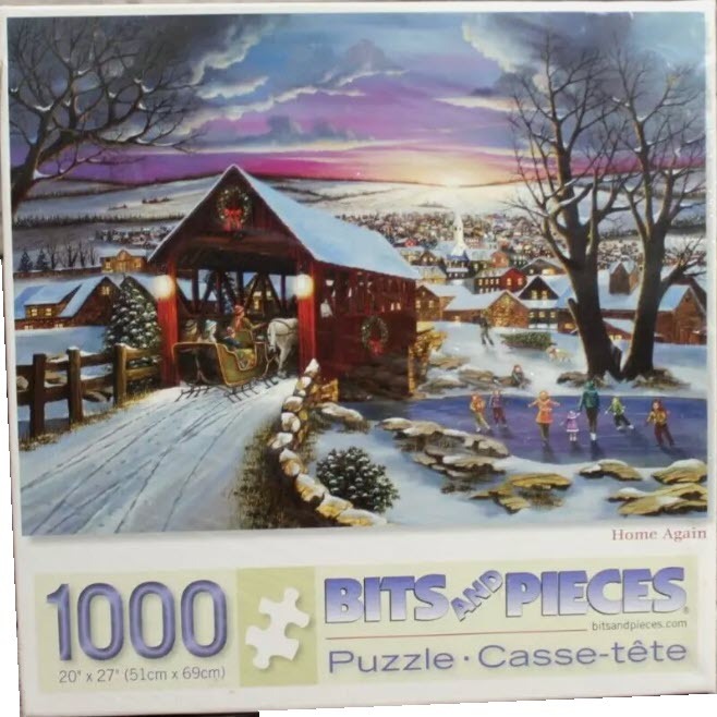 A horse-drawn sleigh passes through a covered bridge in a snowy winter village at twilight.
