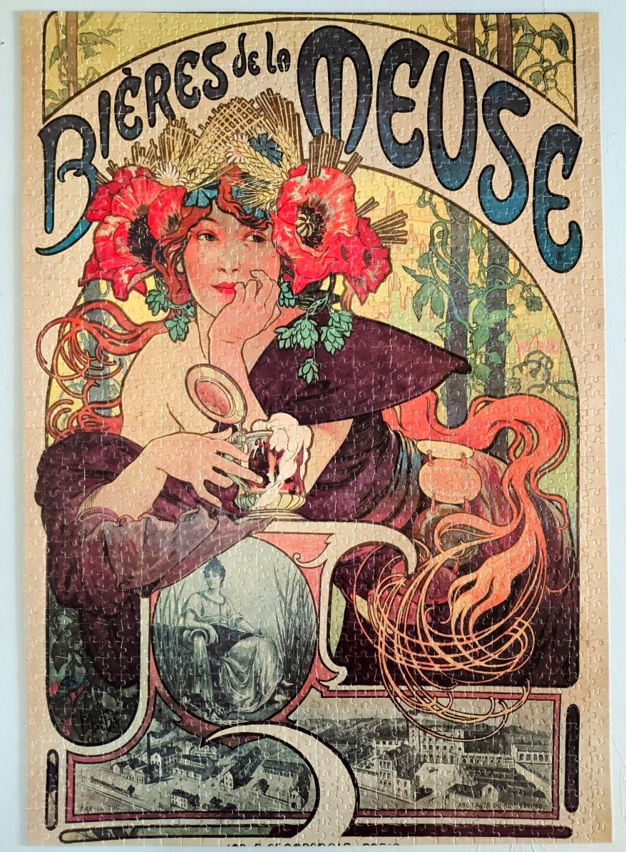 Art Nouveau poster illustration featuring a woman with red hair and poppies, titled Bières de la Meuse.