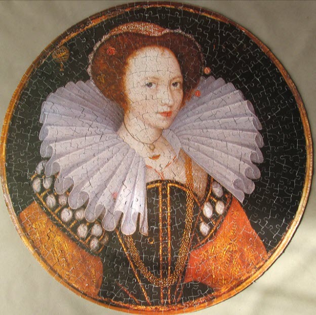 Portrait of an Elizabethan woman with a large white ruff collar against a dark background in a circular format.