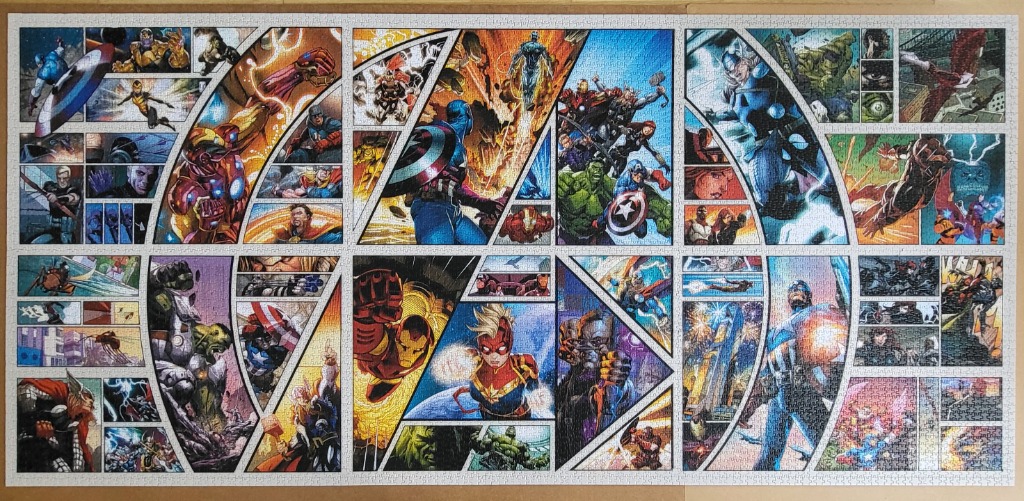 A panoramic montage of comic book-style Marvel superhero illustrations featuring Iron Man, Captain America, and Thor.