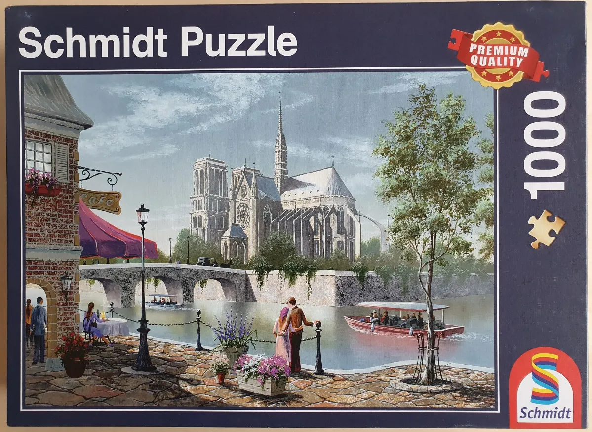 Painting of Notre Dame Cathedral seen from a riverbank cafe with figures and a tour boat.