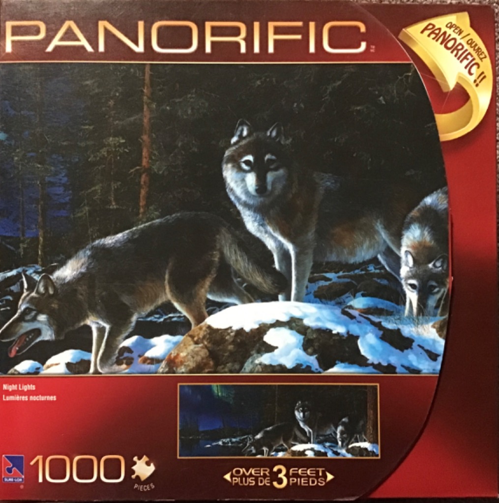 Three wolves walking through a snowy, moonlit forest at night