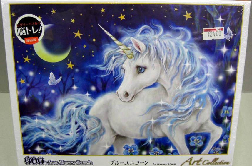 A fantasy illustration of a white unicorn with a glowing blue mane in a starry night forest.