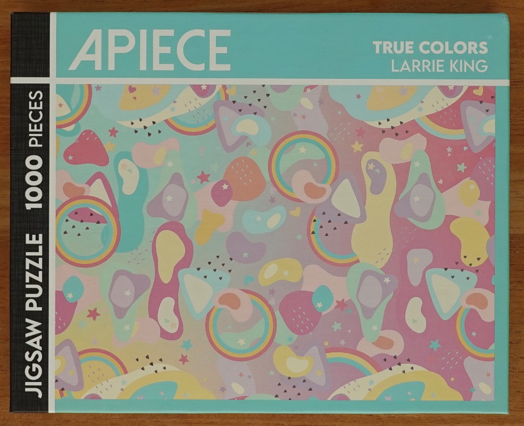 Abstract pattern with pastel rainbows, amoeba-like blobs, and stars on a soft pink and turquoise background.