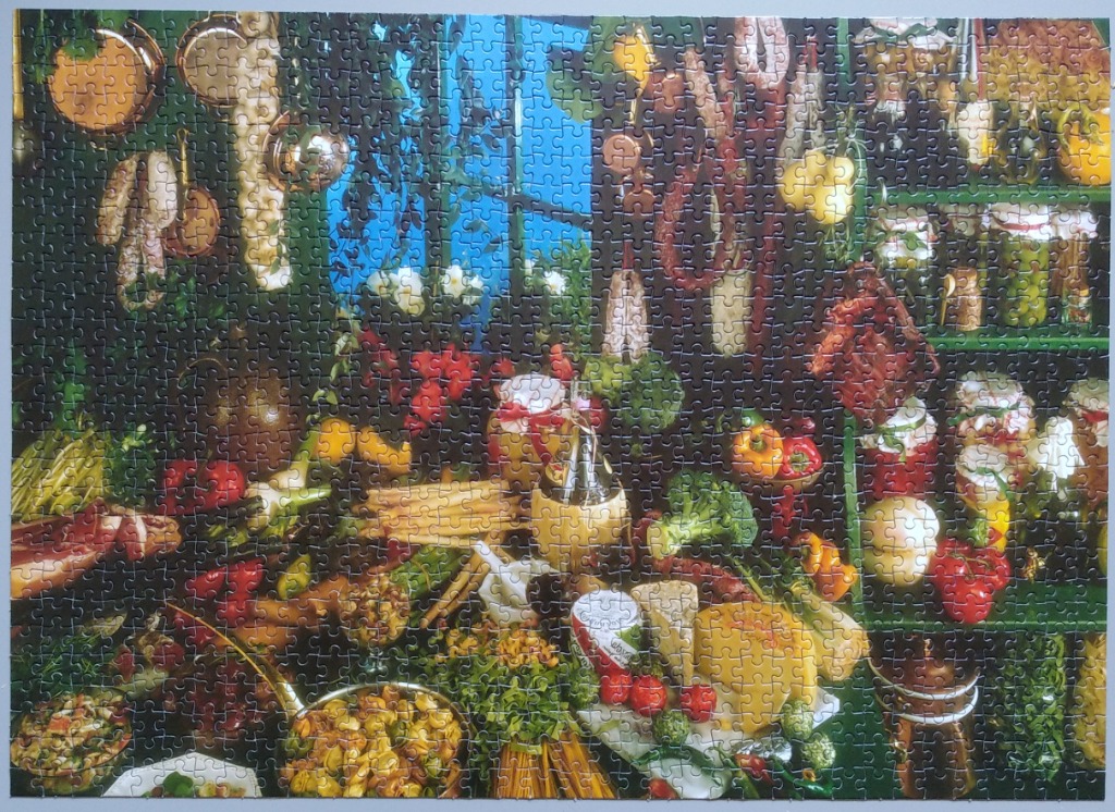 A rustic pantry or kitchen scene filled with fresh produce, hanging cured meats, and jars of preserved food.