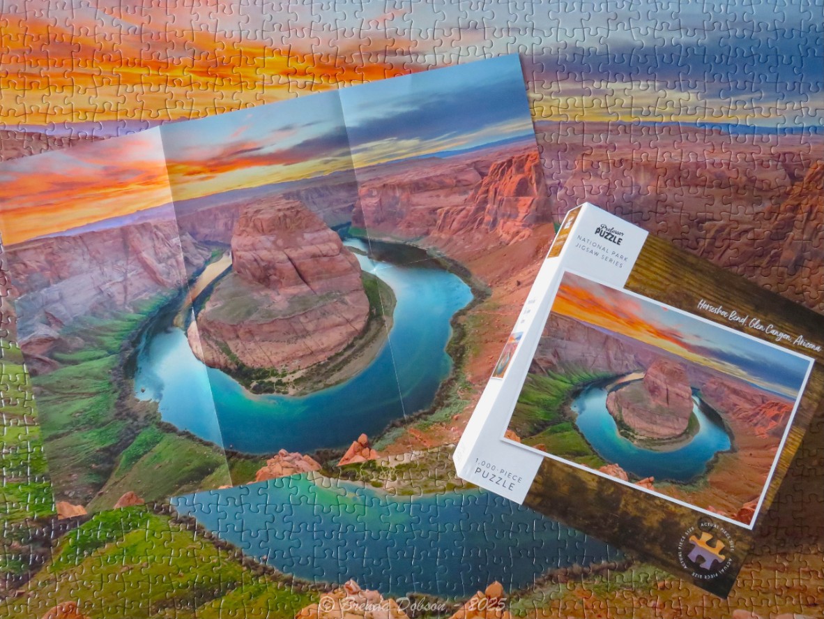 Aerial view of Horseshoe Bend at sunset, featuring the Colorado River winding through dramatic canyon walls.