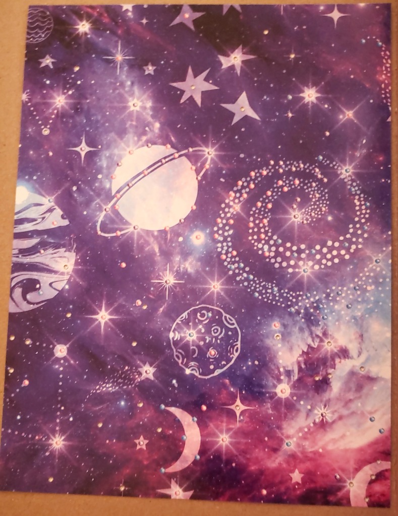 A whimsical cosmic scene featuring planets, a moon, and a spiral galaxy against a starry purple nebula background.
