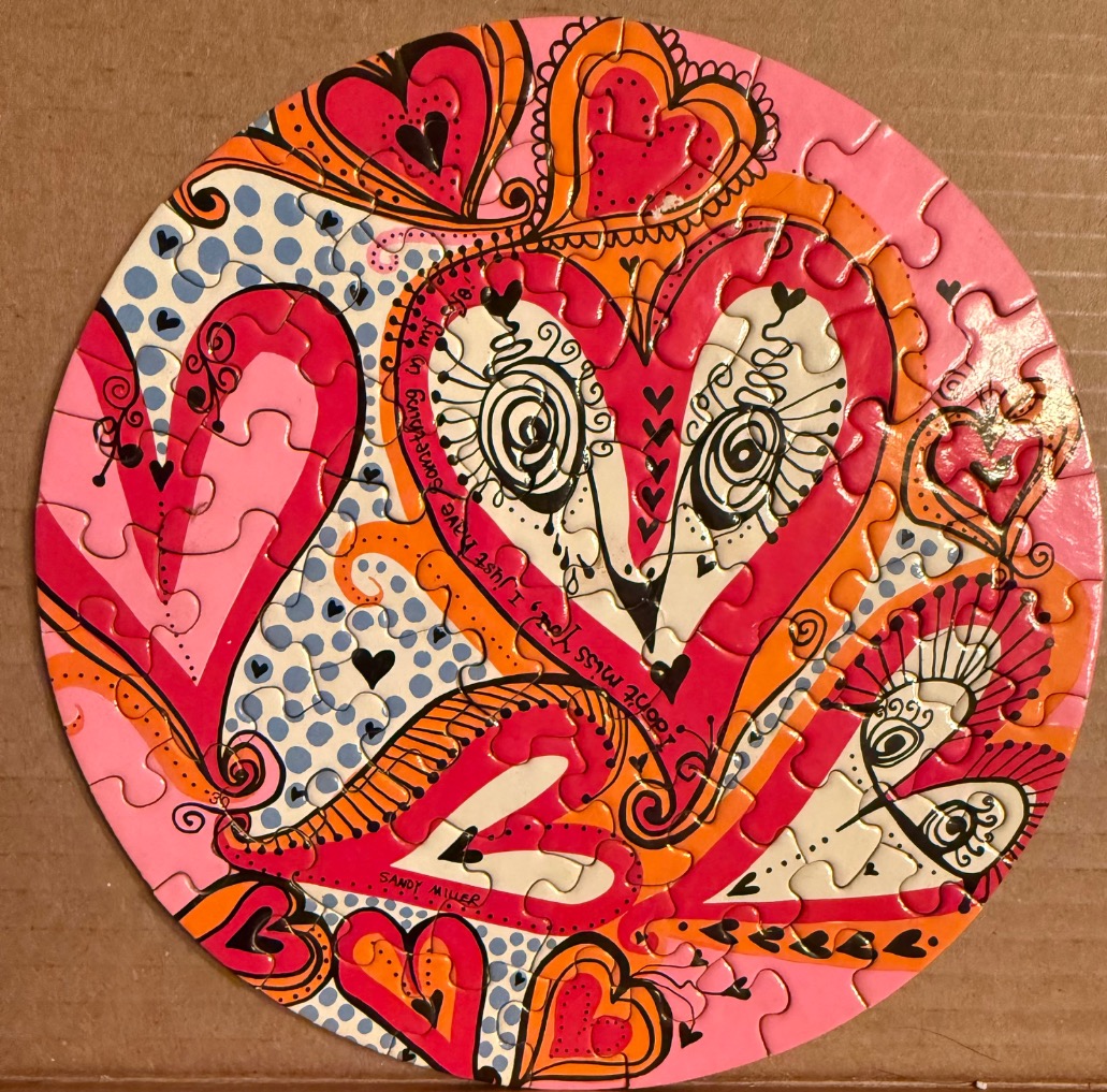 Circular illustration filled with whimsical, stylized hearts in shades of pink, orange, and cream with black linework.