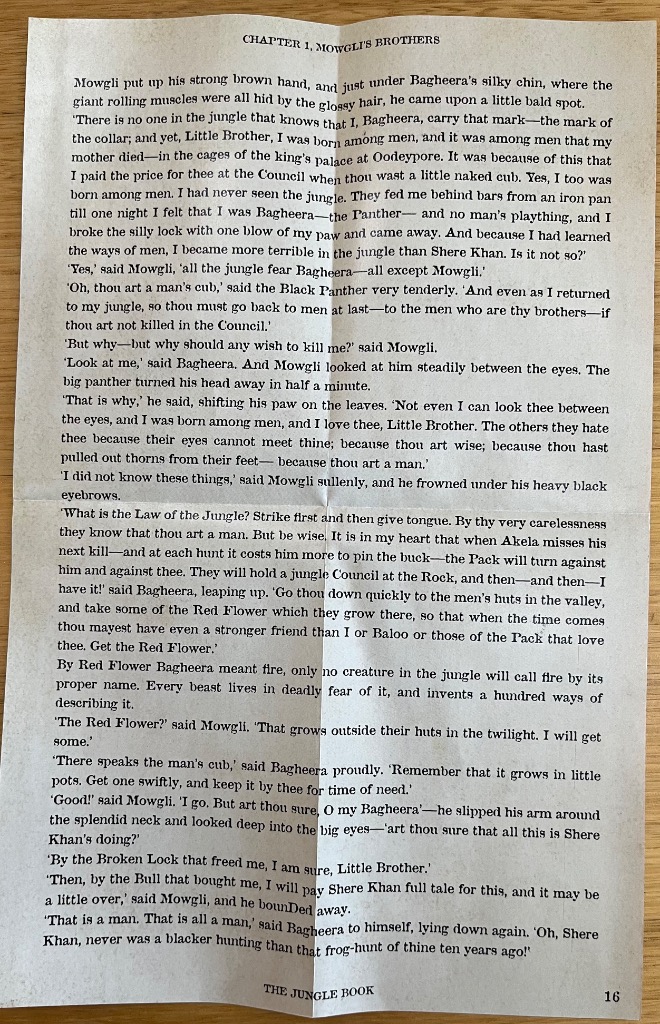 A page from The Jungle Book titled Chapter 1, Mowgli's Brothers, printed on folded paper.